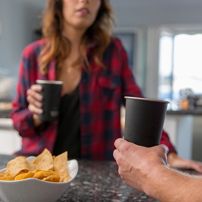 16oz-pint-cup-y6 16ounce_steel_pint_cup_black_party_lifestyle_e7c4b89f-bee2-44df-bb63-bc286febb421.jpg