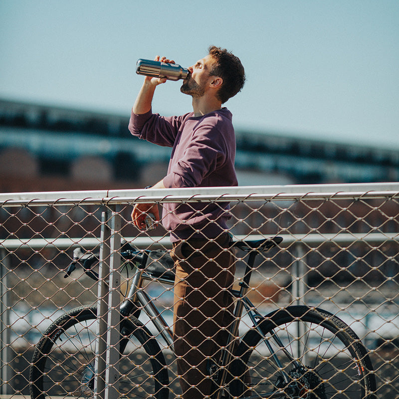 20oz-rise-reflect-with-bamboo-cap-p7 16oz_rise_reflect_man_bike_square.jpg