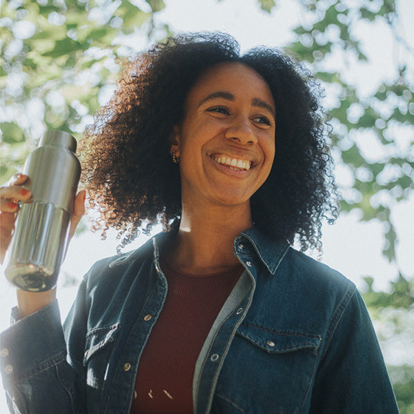 bring-your-own-party-kit-tumblers-and-cocktails-i2 16oz_rise_reflect_woman_smile_square.jpg