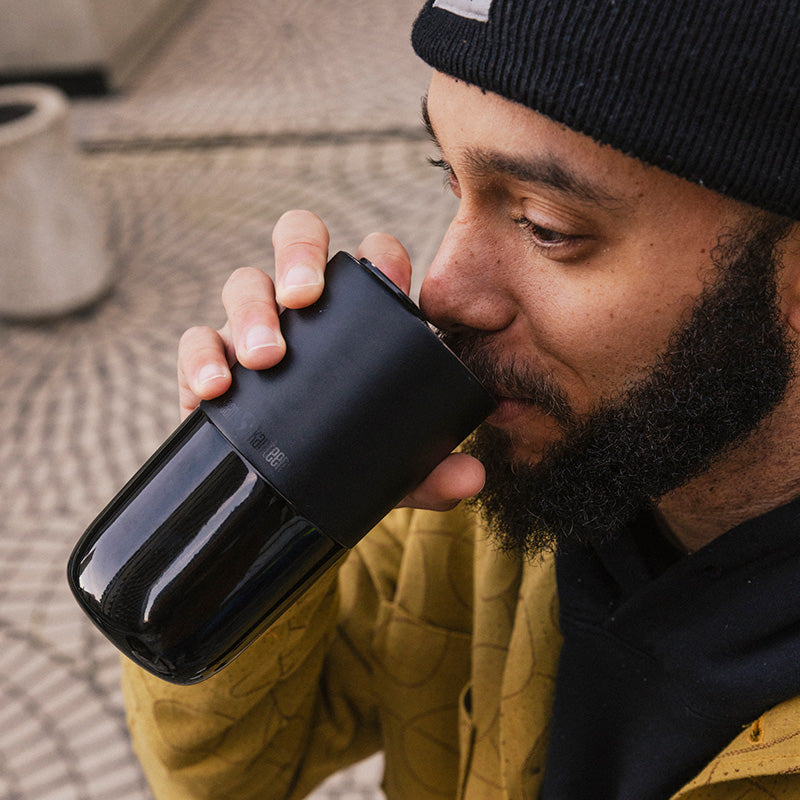 16oz-rise-tumbler-u7 16oz_rise_tumbler_black_man_drink_square.jpg