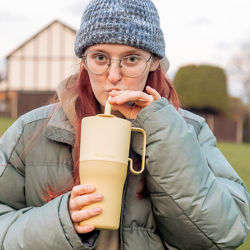 26oz-rise-tumbler-with-straw-lid-u0 26oz_rise_rumbler_straw_wax_yellow_woman_sip_square.jpg