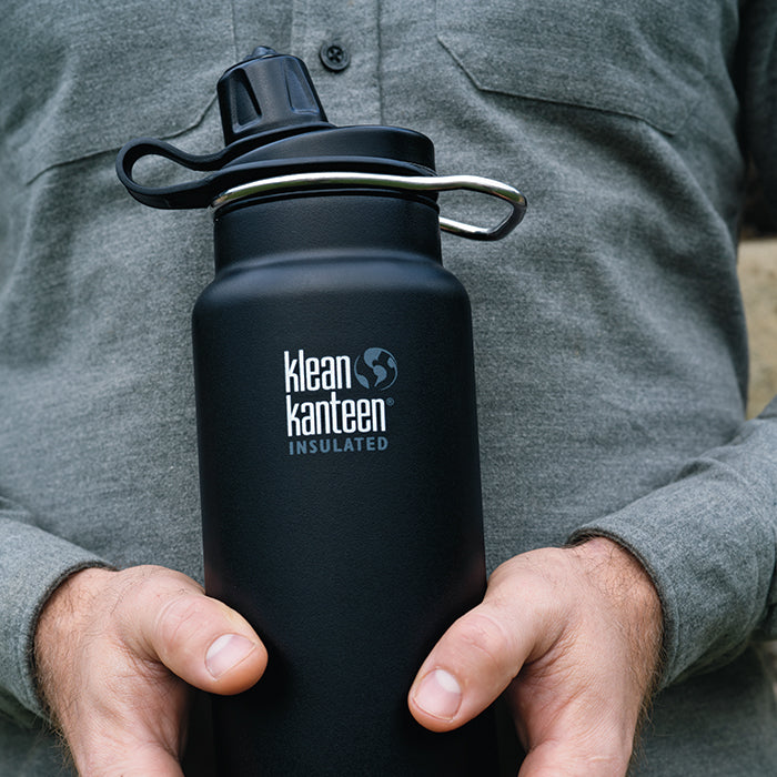 tkwide-chug-cap-q6 K32TKWSSL-SB-Craddled-Bottle_closeup_lifestyle.jpg