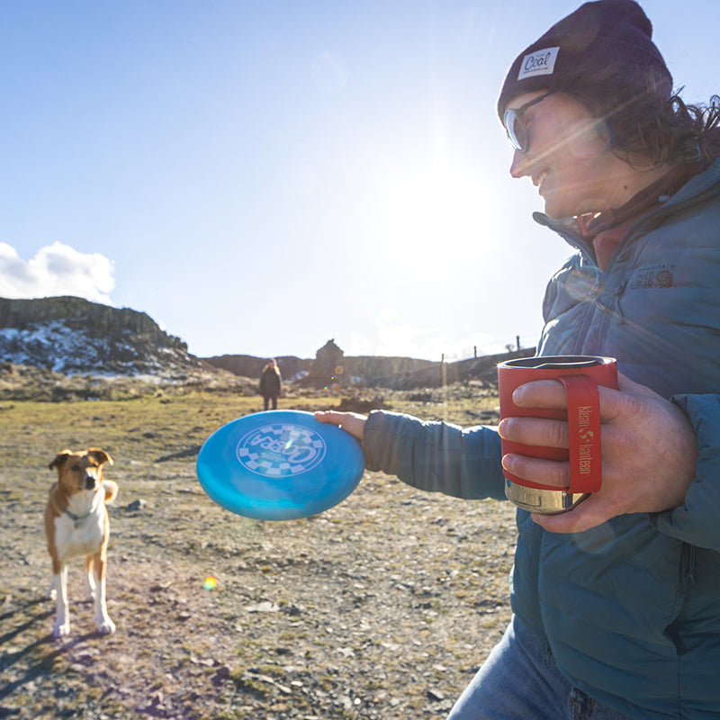 12oz-camp-mug-l2 insulated_camp_mug_12oz_woman_dog_frisbee_square.jpg
