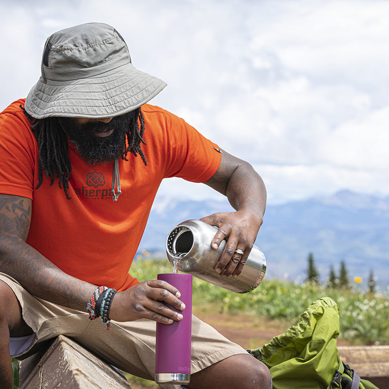 64oz-tkwide-with-loop-cap-q1 tkwide_64oz_bottle_backpacker_mountains_filling_square.jpg